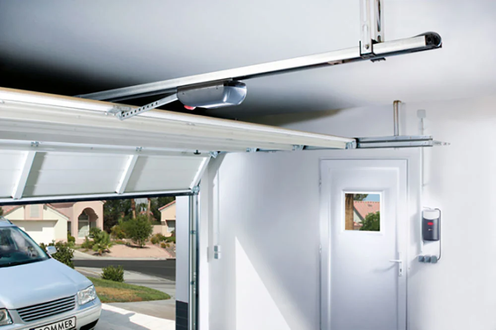 Modern garage door system with advanced safety features including auto-reverse sensors and smart opener technology.